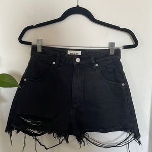Rollas high rise black denim “duster” distressed shorts.